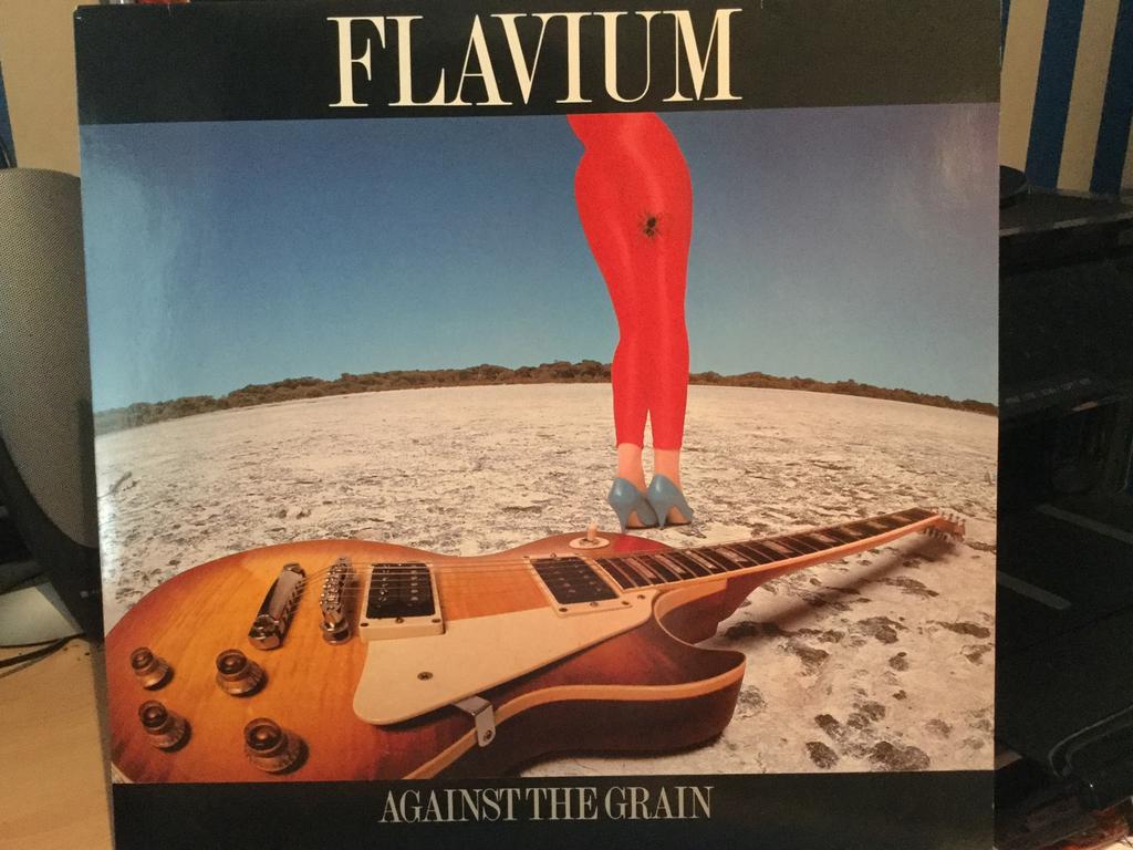 Flavium-Against the grain. Origineel in excellente topstaat., Cd's en Dvd's, Vinyl | Rock, Ophalen of Verzenden, Zo goed als nieuw