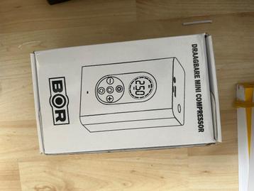 Draagbare mini compressor (geschikt voor vele type banden) beschikbaar voor biedingen