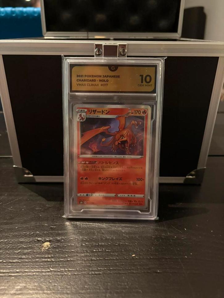 Charizard grade 10 vmax climax, Hobby en Vrije tijd, Verzamelkaartspellen | Pokémon, Zo goed als nieuw, Meerdere kaarten, Foil