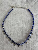 Blauw zilver kleurige ketting met soort kruisjes eraan, Sieraden, Tassen en Uiterlijk, Kettingen, Blauw, Gebruikt, Ophalen of Verzenden