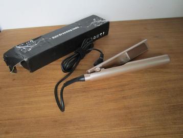 Nr.50: Stijltang krultang Nieuw in de doos licht roze van kl beschikbaar voor biedingen