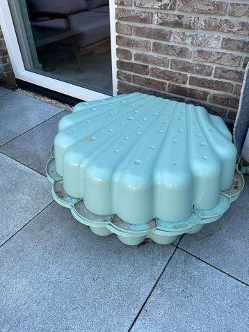 Zandbak schelp mint groen beschikbaar voor biedingen