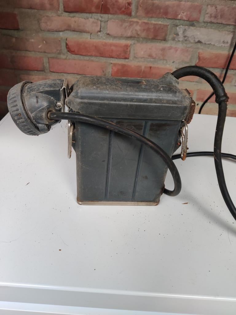 Mijnwerkers lamp, Ophalen