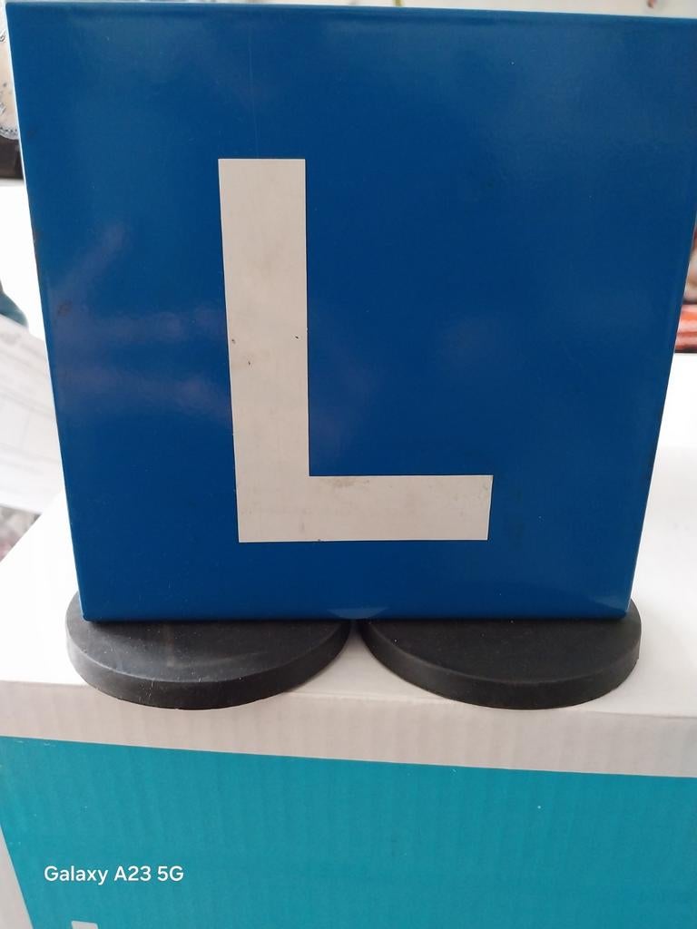 Les dakbord magneet., Ophalen