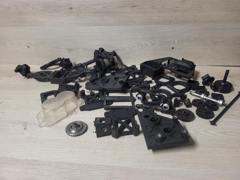 Party reely carbon fighter onderdelen, Ophalen of Verzenden, Overige schalen, Onderdeel