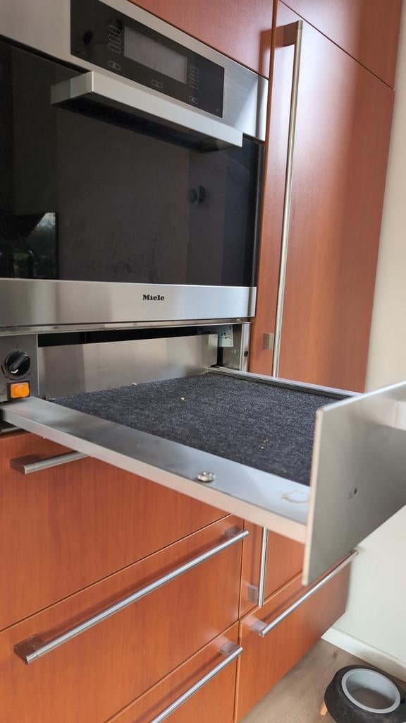 Miele warmhoudlade/servieslade, Ophalen