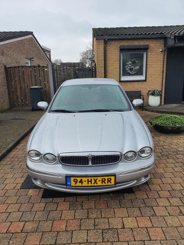 Jaguar X-Type 3.0 V6 Executive AUT 4WD 2002 Grijs, Auto's, Jaguar, Zwart, Particulier, 6 cilinders, 1500 kg