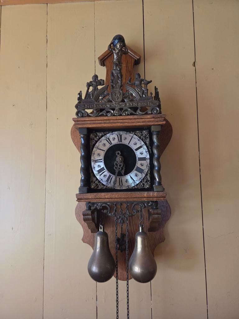 Zaanse klok, Ophalen