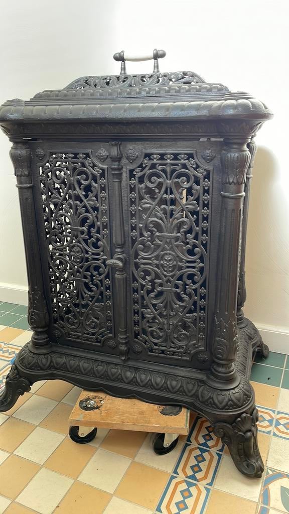 Oude kachel , mooi smeedijzer, Ophalen