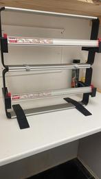 Inpakpapier houder, Ophalen