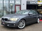 BMW 1-serie 116i Sportline+ 5Drs Automaat, Navi, PDC V-A Net, Euro 5, Gebruikt, Zwart, 4 cilinders