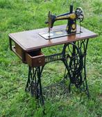 Oude Singer naai machine, Ophalen