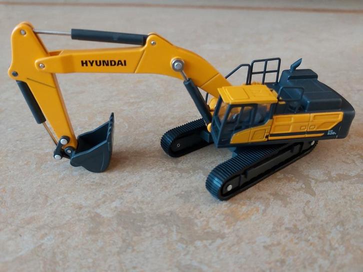 Hyundai HX520L hydr. rupsgraafmachine van IMC in de OVP 1/87, Hobby en Vrije tijd, Modelauto's | 1:87, Nieuw, Overige typen, Overige merken