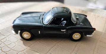 Triumph Spitfire gaaf leuk schaalmodel met vering  beschikbaar voor biedingen