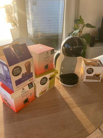 Dolce gusto + cups zie beschrijving beschikbaar voor biedingen