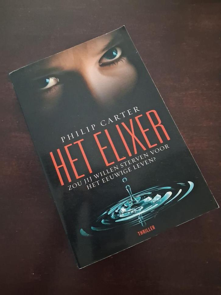 Philip Carter - het elixer, Boeken, Thrillers, Zo goed als nieuw, Ophalen of Verzenden