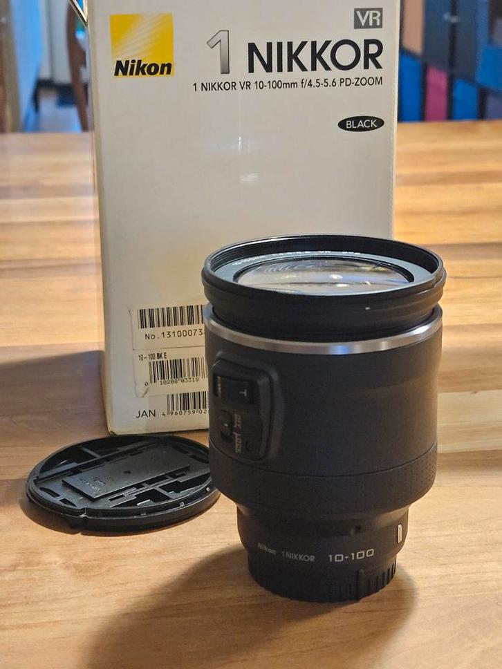 Nikon 1 Nikkor VR 10-100mm PD-ZOOM Lens, veel extra's, Audio, Tv en Foto, Fotografie | Lenzen en Objectieven, Zo goed als nieuw