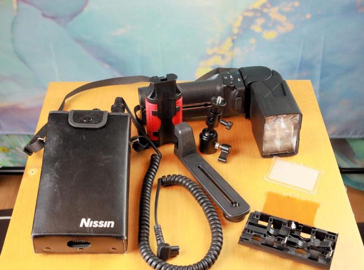 Nissin MG10 Flitser +  powerpack PS300, Audio, Tv en Foto, Fotografie | Flitsers, Gebruikt, Overige merken, Kantelbaar, Ophalen