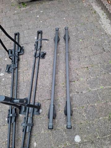 Thule 2 dakdragers met 2 fietsendragers in goede staat inclu beschikbaar voor biedingen