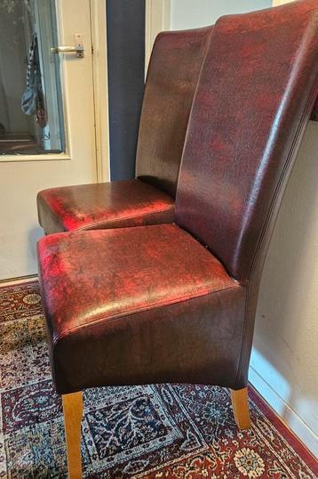 4 prachtige leren eetkamer stoelen beschikbaar voor biedingen