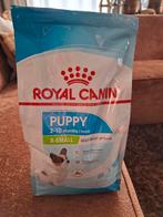 Nieuwe zak hondenbrokken voor puppy's van Royal canin, Ophalen, Hond