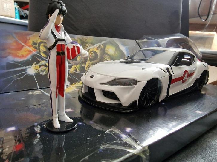 Toyota Supra met Rick Hunter figuur Jada 1:24, Hobby en Vrije tijd, Modelauto's | 1:24, Nieuw, Auto, Jada, Ophalen of Verzenden