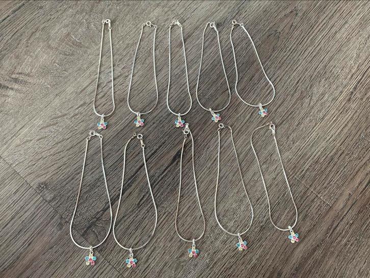 Partij 10 stuks enkelbandjes, Sieraden, Tassen en Uiterlijk, Enkelbandjes en Enkelkettinkjes, Nieuw, Overige materialen, Ophalen of Verzenden