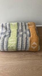 Wollen deken, Ophalen, Gebruikt