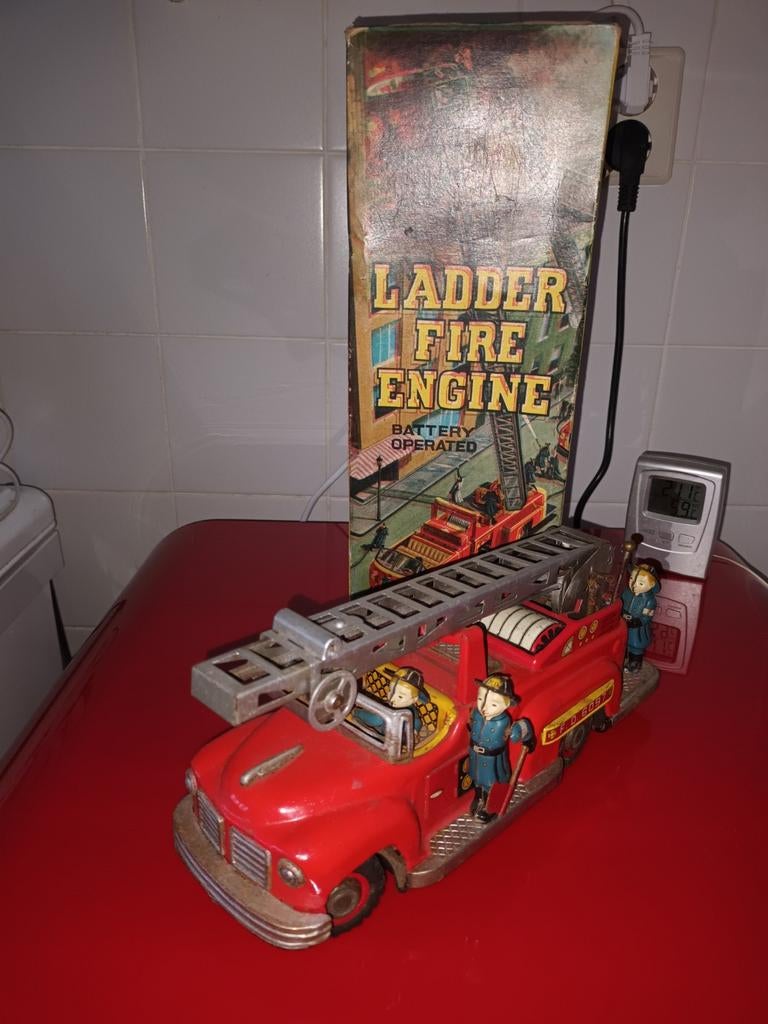 Blikken speelgoed. Brandweer ladderwagen. Doos. Nomura Japan, Antiek en Kunst, Antiek | Speelgoed, Ophalen of Verzenden