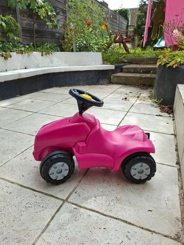 Hele mooie Rolly Toys roze looptractor beschikbaar voor biedingen