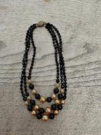 Zwart/goudkleurige kralenketting met 3 snoeren, Sieraden, Tassen en Uiterlijk, Kettingen, Ophalen of Verzenden, Gebruikt, Zwart