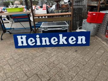 Heineken kunststoffen reclamebord beschikbaar voor biedingen