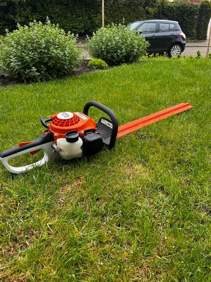 TE HUUR Stihl HS45 heggenschaar, Tuin en Terras, Heggenscharen, Gebruikt, Benzine, Ophalen of Verzenden