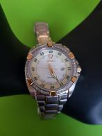 staal met geelgoud armband horloge met brilj lunet, Staal, Nieuw, Ophalen of Verzenden, Met edelsteen