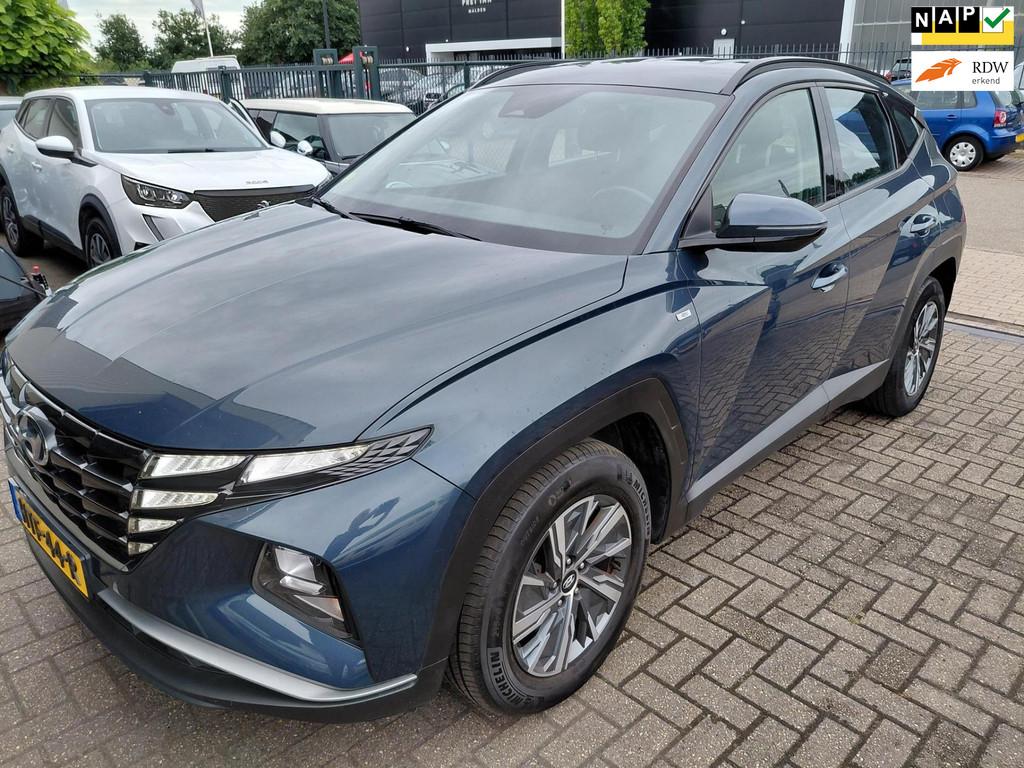 Hyundai Tucson Hybride Automaat, Auto's, Hyundai, 136 pk, Gebruikt, Blauw, 1650 kg