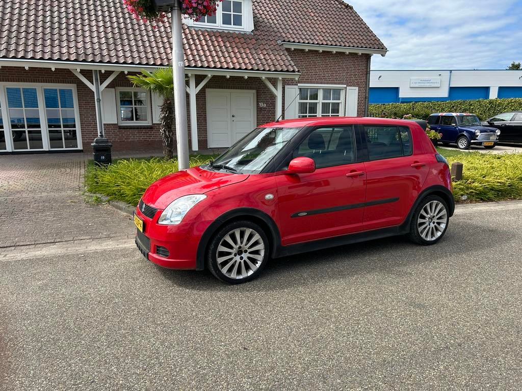 Suzuki Swift 1.3 5D 2008 Rood 212112 km, Auto's, Suzuki, Voorwielaandrijving, 40 €/maand, 965 kg, 400 kg