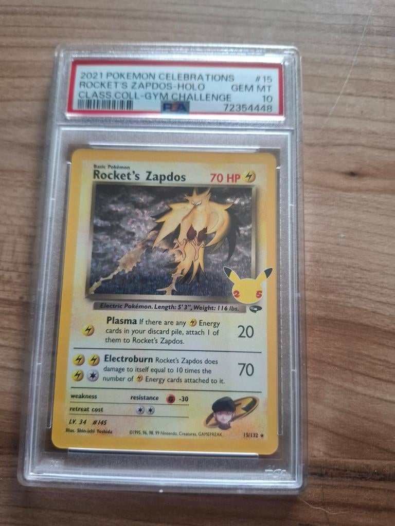 PSA 10 Rocket's Zapdos Holo Celebrations Pokémon Kaart, Ophalen of Verzenden, Nieuw, Losse kaart, Foil