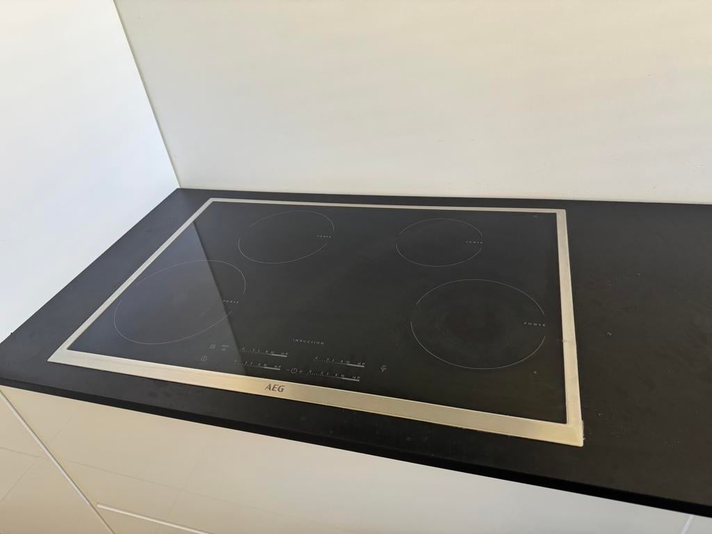 AEG inductieplaat werkt goed, 75 tot 150 cm, Raamkozijn, Ophalen of Verzenden, Zo goed als nieuw
