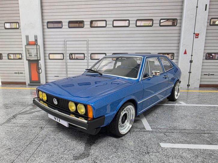 Vw Scirocco GTI MK1 1976 op verbreed staal 1:18 in OVP, Hobby en Vrije tijd, Modelauto's | 1:18, Zo goed als nieuw, Overige merken