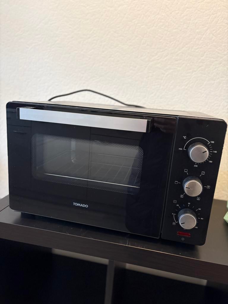 Mooie oven van tomado, Witgoed en Apparatuur, Ovens, Ophalen, Zo goed als nieuw, Minder dan 45 cm