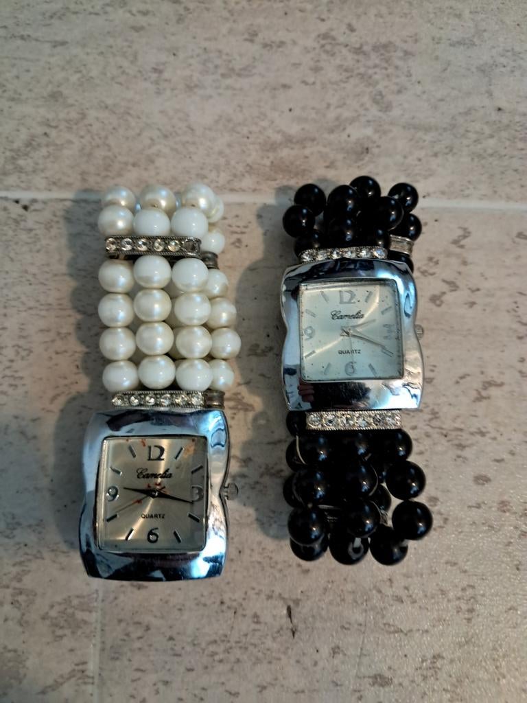 2 stuks Dames Kamelia horloges in goede staat, Ophalen of Verzenden, Zo goed als nieuw, Staal, Overige merken