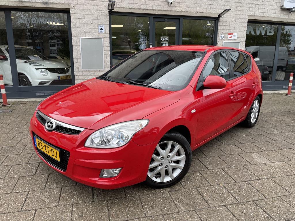 Hyundai i30 1.6i Style 5Drs Airco Trekhaak Half leer, Auto's, Gebruikt, 1591 cc, 4 cilinders, Origineel Nederlands