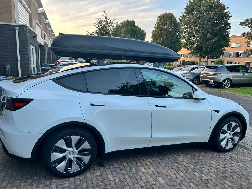 Tesla Model Y dakdragers te huur, Ophalen, Zo goed als nieuw