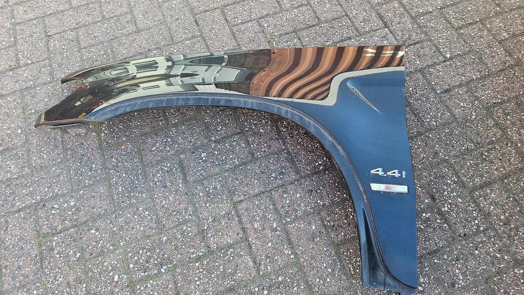 Voorscherm spatbord linksvoor BMW X5 serie E53 kleur Cosmos, Gebruikt, -, Links, Ophalen of Verzenden