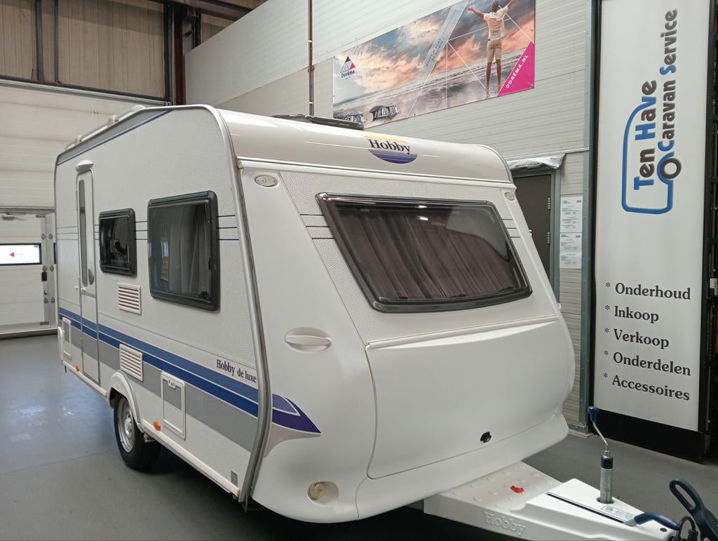 Hobby De Luxe 400 SF in TOPSTAAT incl. voortent luifel mover, Hobby, Bedrijf, Treinzit, 750 - 1000 kg