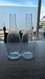 2 grote decotatie flessen van riviera maison, Huis en Inrichting, Gebruikt, Overige kleuren, Ophalen of Verzenden, Glas