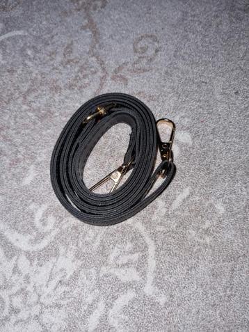 Handtasband beschikbaar voor biedingen