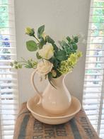 Landelijke  lampetkan met bloemen, Ophalen