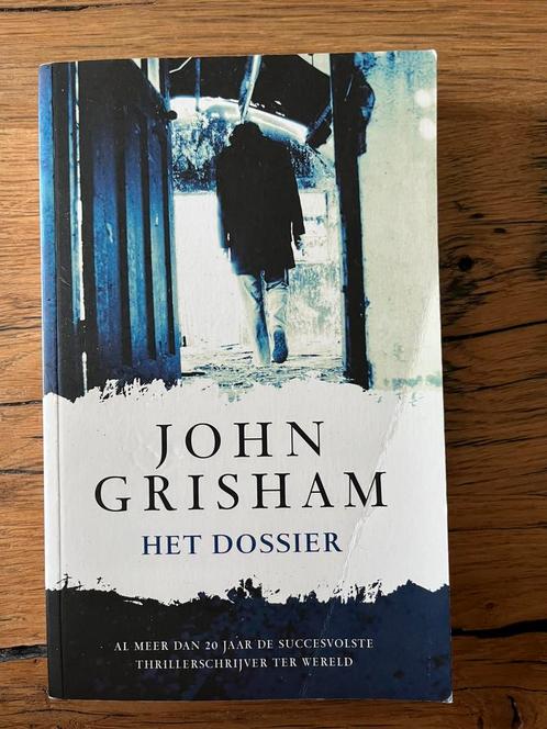 John Grisham - Het dossier, Boeken, Thrillers, Zo goed als nieuw, Nederland, Ophalen of Verzenden