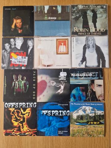 12 Rock CD singles in 1 koop voor 15 euro beschikbaar voor biedingen